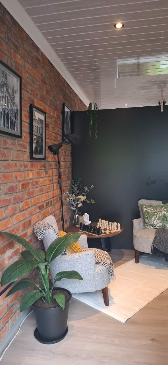 Portrait view of the living room corner at Studio 149